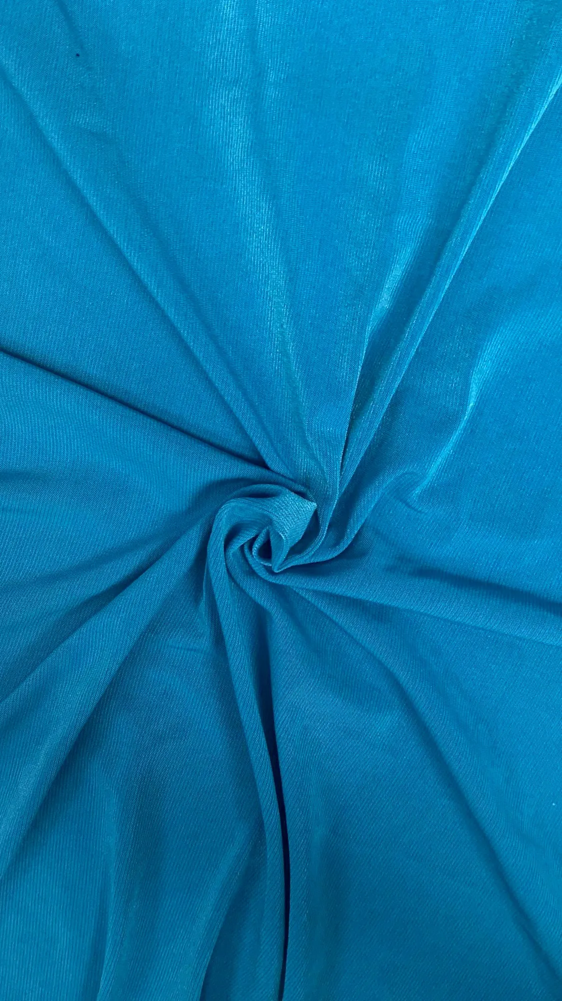 250 GLY POLY STRETCHED ITY MATTE JERSEY KNIT<br><h6>12B-TURQUOISE<br>126A-ITY</h6>