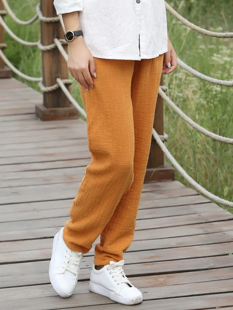 Women Pure Color Elastic Waist Pocket Cotton Pants